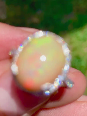 Oval Opal Halo Ring with Diamond Accents 18K 5.50ctw