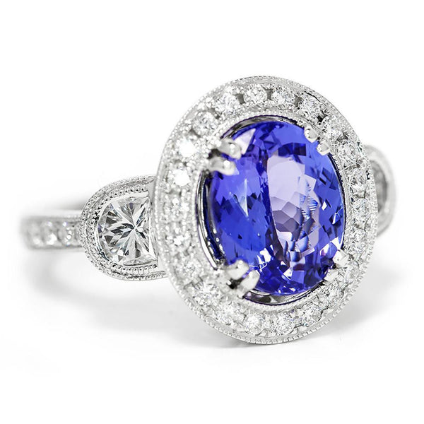Oval Tanzanite Halo Ring with Half Moon Diamond’s 18K - Image 3