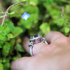 Once Upon A Diamond Ring Oval Tanzanite Halo Ring with Half Moon Diamond’s in 18kt White Gold 3.80ctw